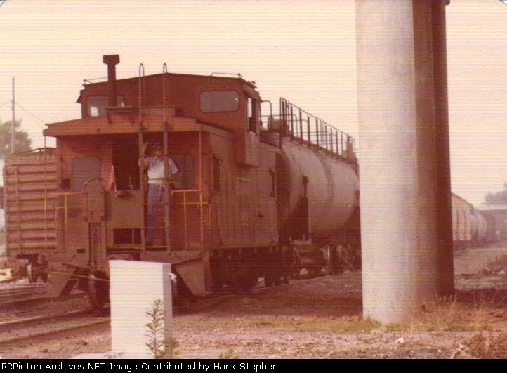 A wave from the rear end as a SAL caboose tails up an AWPWofA